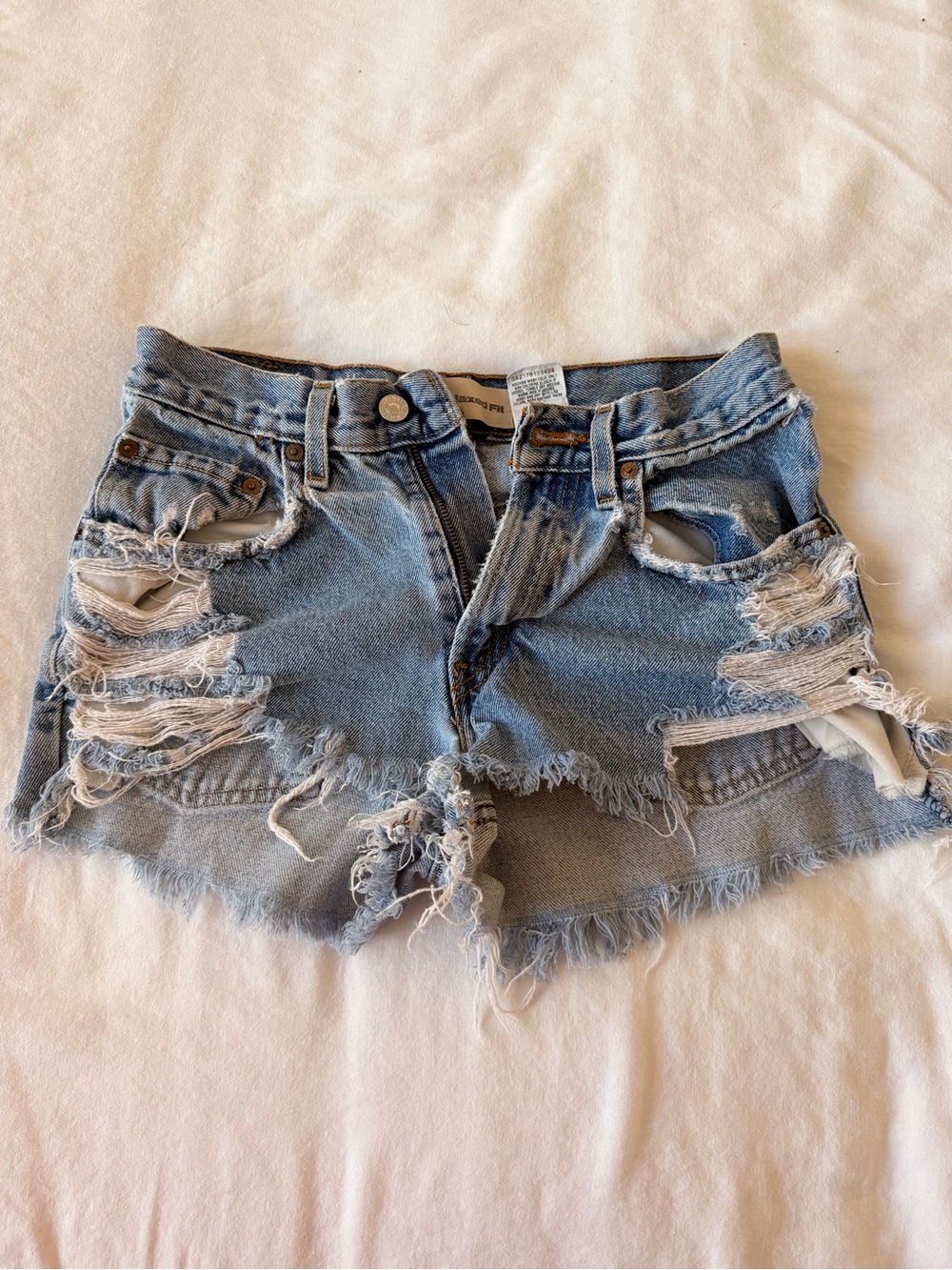 Levi's Light Blue Distressed Denim Shorts